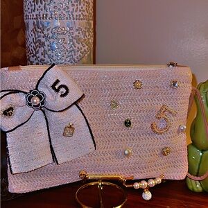 Elegant Faux Straw Wristlet with Bow and Embellishments Charms